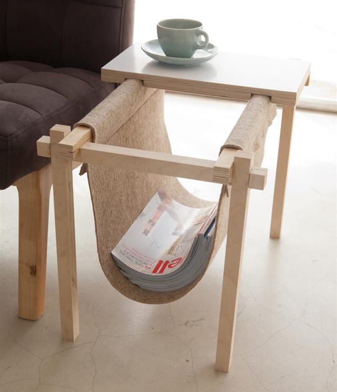 sliding magazine rack under table top