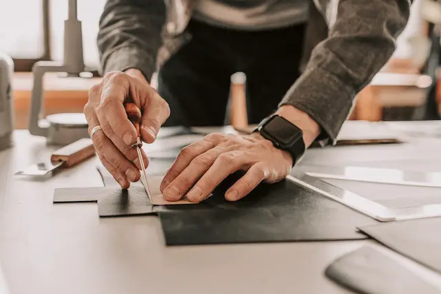 a person handcrafting furniture