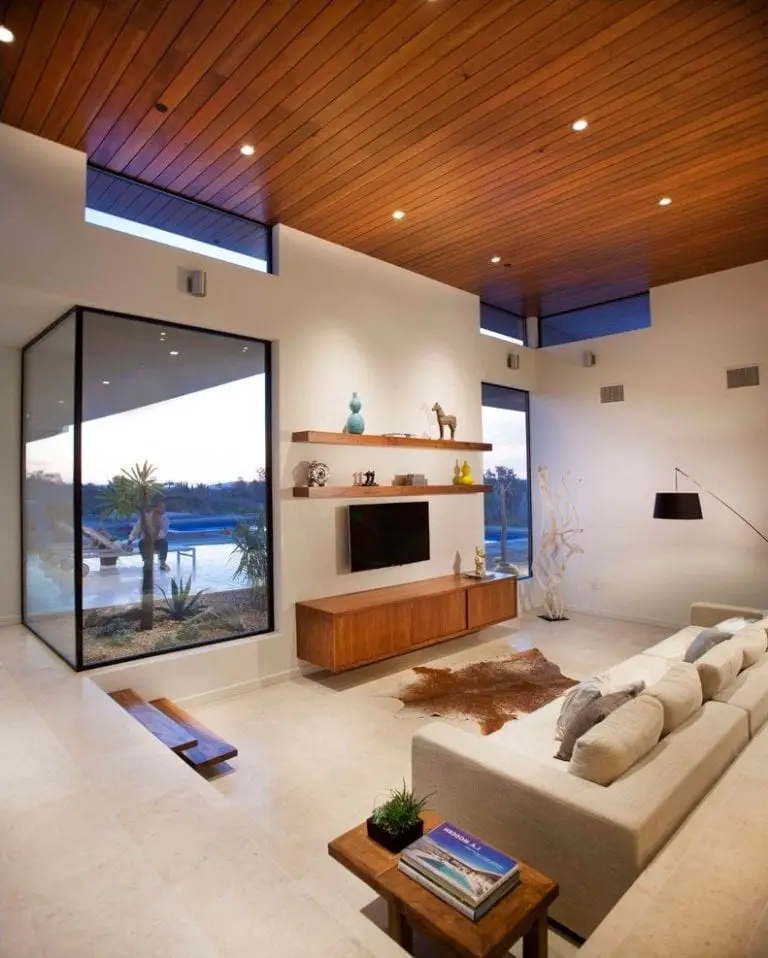 sunken living room with marble floors